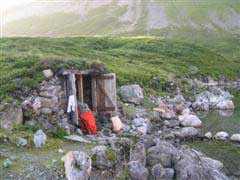 Sleeping in the boat house which is covered with soil